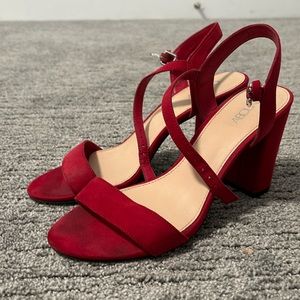 Red heels, been worn